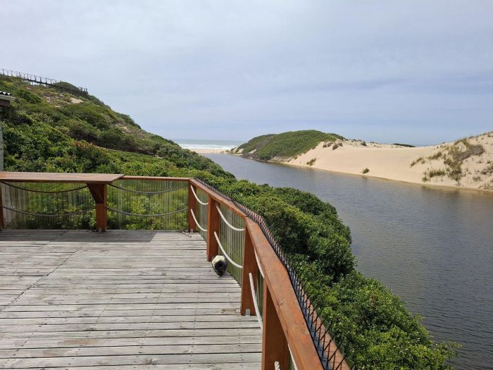 For Sale: House in Moquini Coastal Estate with river views, beach access, and spacious decks.