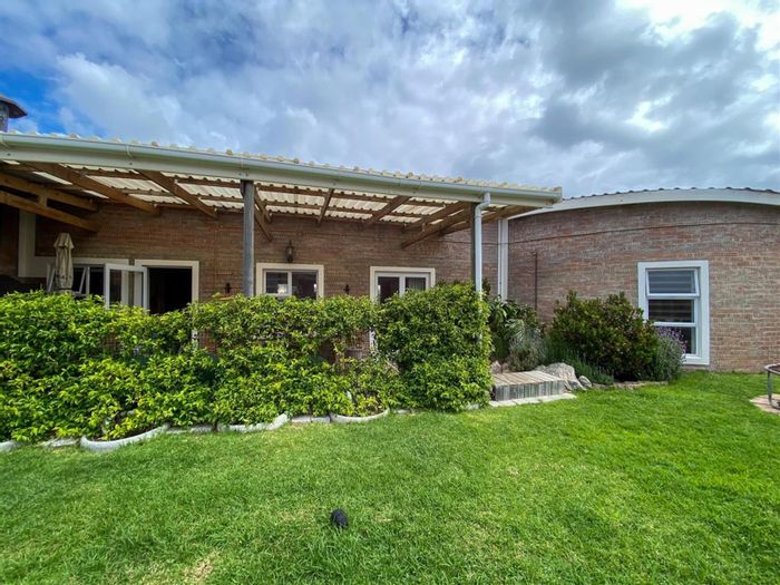 Spacious 4-bedroom house in Bettys Bay Central, for sale with versatile living options.