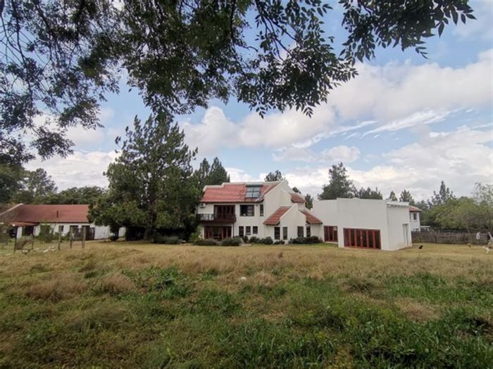Kyalami AH House To Rent: Spacious 4-bedroom home with garden and studio cottage.