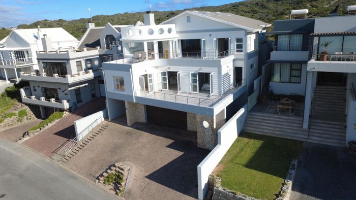 For Sale: House in Stilbaai Oos with ocean views, garage, and beach access.
