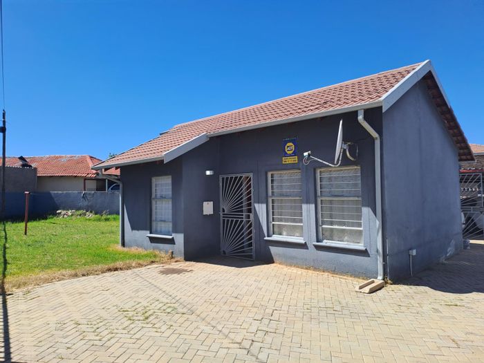 For Sale: Roodepan House with 2 Bedrooms, Double Carport, and Electric Gate.