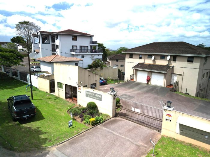 For Sale: House in New Germany with 2 bedrooms, garage, and balcony access.