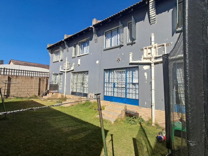 Turffontein Commercial Property For Sale: Fully occupied, income-generating 4 x 2-bedroom units.