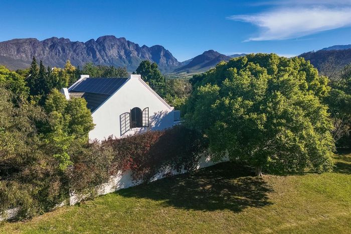 For Sale: House in Franschhoek Central with pool, garden, and energy-efficient features.