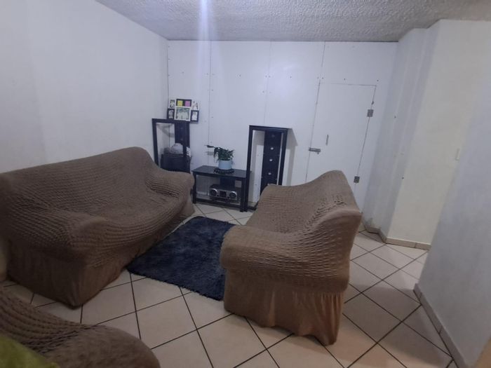 3-Bed Apartment For Sale in Pretoria West with lift access and covered parking.