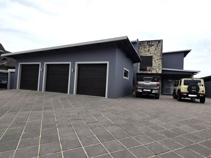 For Sale: House in Mzingazi Golf Estate with pool, study, and 24-hour security.