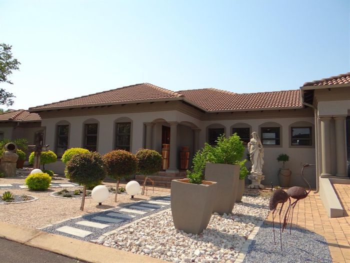 For Sale: House in Midstream Estate with pool, office, and spacious patio.