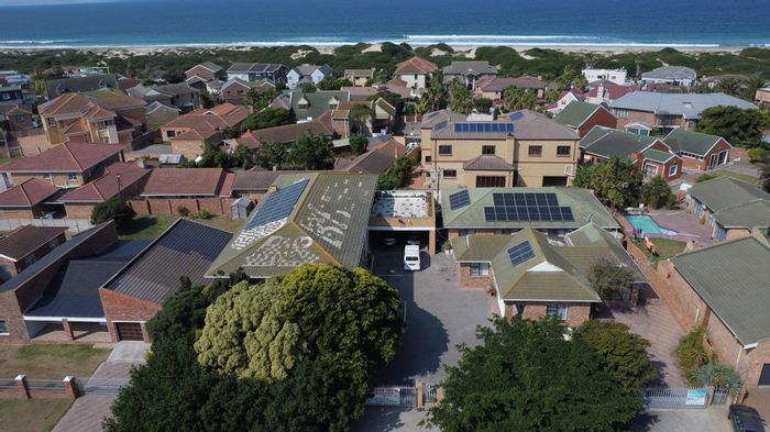 For Sale: House in Bluewater Bay with 8 bedrooms, bar, ocean views, and security.