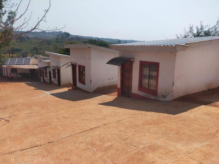 Lodge for sale in Thohoyandou Rural with six rooms, shop, and ample land.