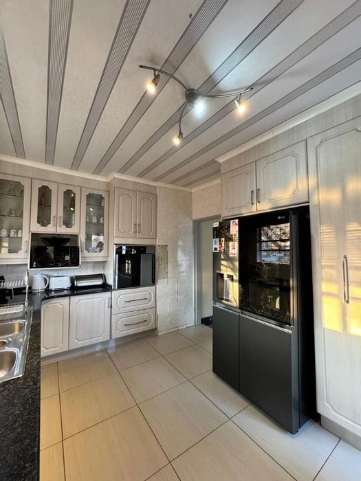 For Sale: House in Ncandu Park with 4 bedrooms, garden, and open-plan living.