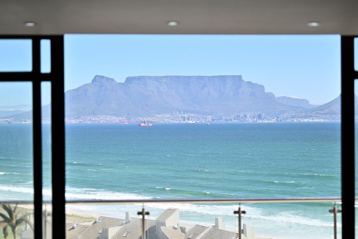 For Sale: Penthouse in Table View with ocean views, gourmet kitchen, and concierge services.