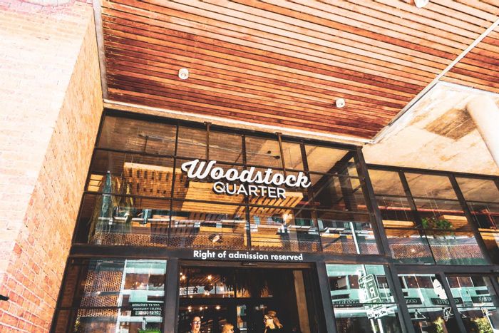 For Sale: Apartment in Woodstock with rooftop pools, gym, and retail amenities.