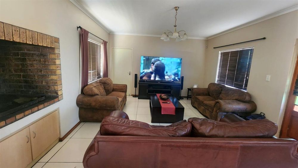 Downstairs lounge with built in braai.