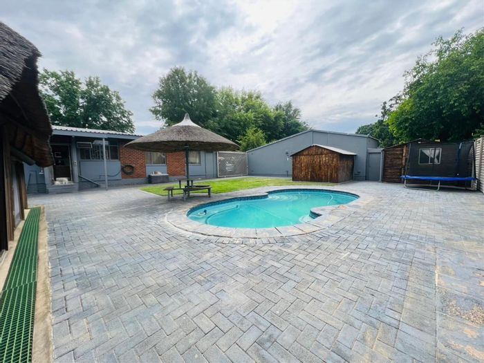 For Sale: Spacious 4-bedroom house in Sasolburg Central with pool and security features.