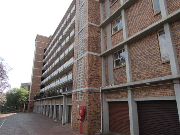 For Sale: 2-bedroom apartment in Wonderboom South with secure parking and water included.