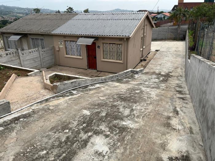 For Sale: 2-bedroom house in Trenance Manor with secure parking and pet-friendly yard.