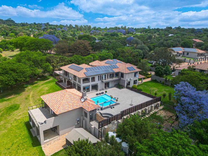 For Sale: House in North Riding AH with pool, multiple properties, and solar power.