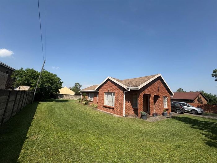 For Sale: House in Pioneer Park with 3 bedrooms, double garages, and spacious yard.