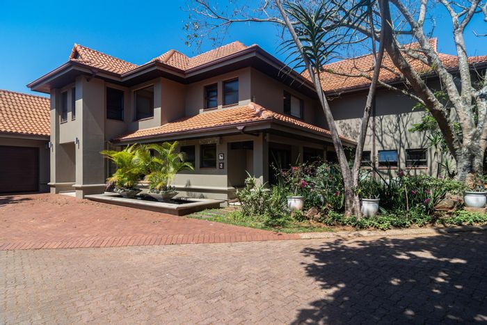 For Sale: House in Port Zimbali with Koi pond, guest flat, and solar power.