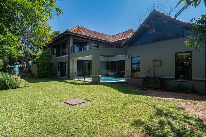 For Sale: House in Port Zimbali with Koi pond, guest flat, and solar power.