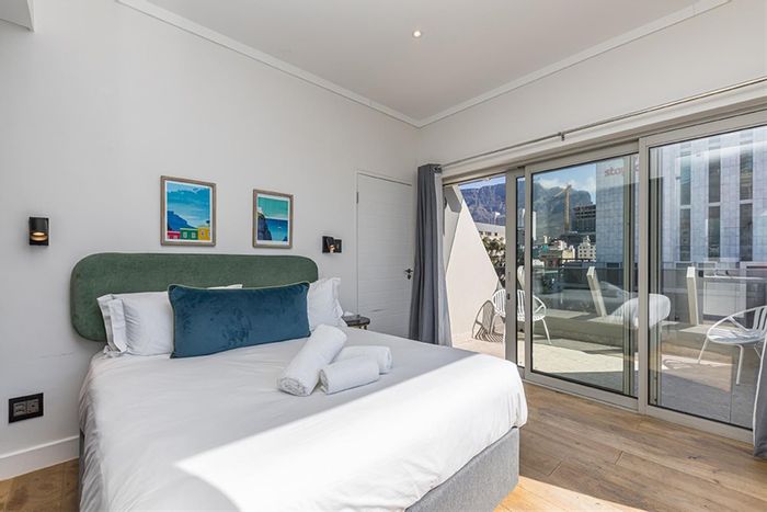 For Sale: Apartment in Cape Town City Centre with two balconies and rooftop amenities.