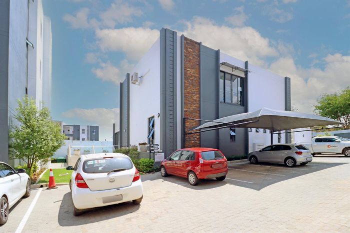 For Sale: 2-Bedroom Apartment in Carlswald with open-plan living and secure complex.