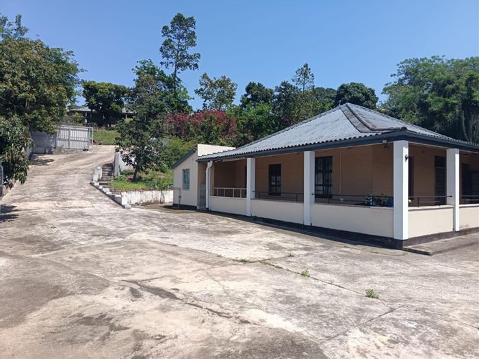 For Sale: House in Umzinto Central with 4 bedrooms, outdoor braai, and versatile space.