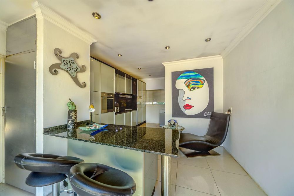 Kitchen with scullery behind the painting