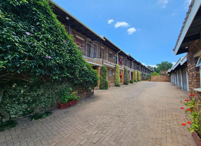 For Sale: 2-Bedroom Townhouse in Ferndale with pool, garage, and great rental potential.