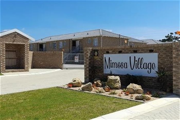 For Sale: Fairview Townhouse with open living, private patio, and secure parking.