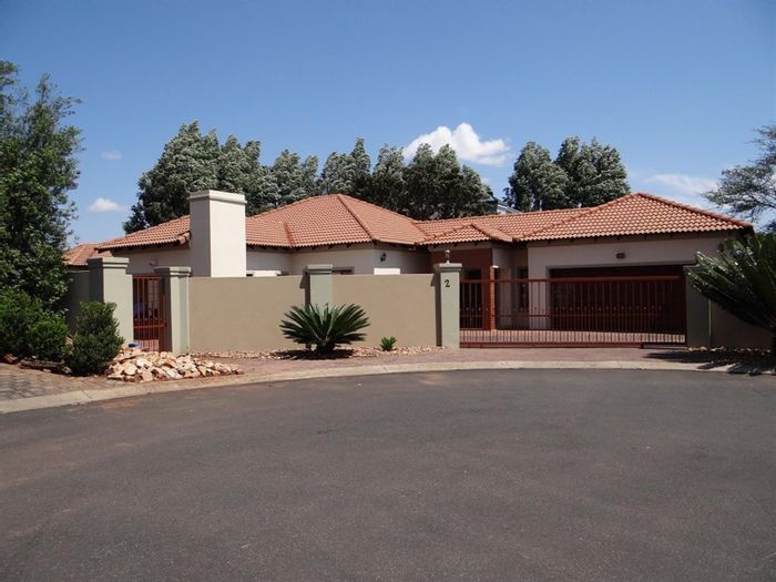 For Sale: Spacious 4-Bedroom House in Midstream Estate with Private Yard and Garages.