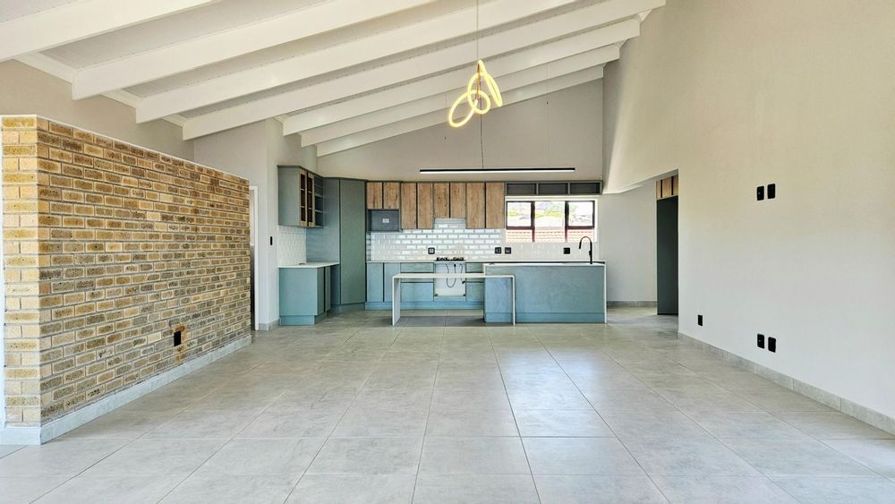 OPEN PLAN LIVING ROOM, DINING ROOM, BRAAI ROOM