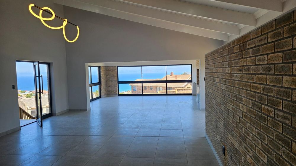 OPEN PLAN LIVING ROOM, DINING ROOM, BRAAI ROOM