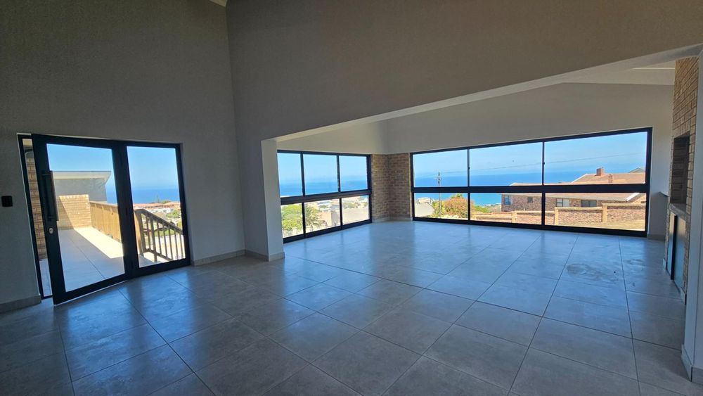 OPEN PLAN LIVING ROOM, DINING ROOM, BRAAI ROOM