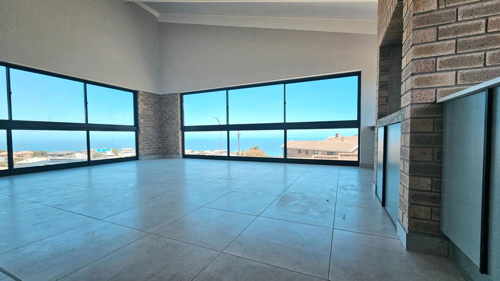 OPEN PLAN LIVING ROOM, DINING ROOM, BRAAI ROOM