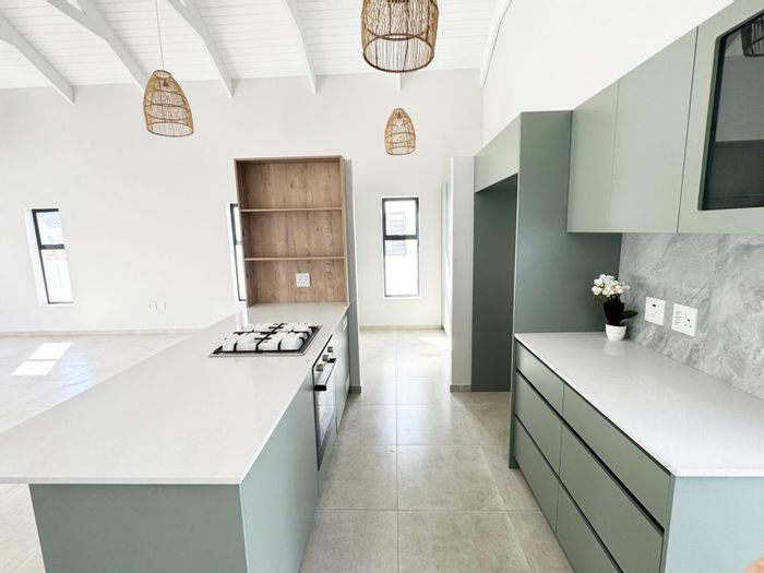 For Sale: House in Britannia Bay with open-plan living, garage, and pet-friendly yard.