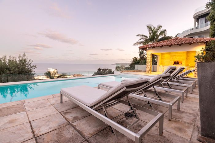 For Sale: House in Signal Hill with 6 en-suite bedrooms, pool, and balconies.