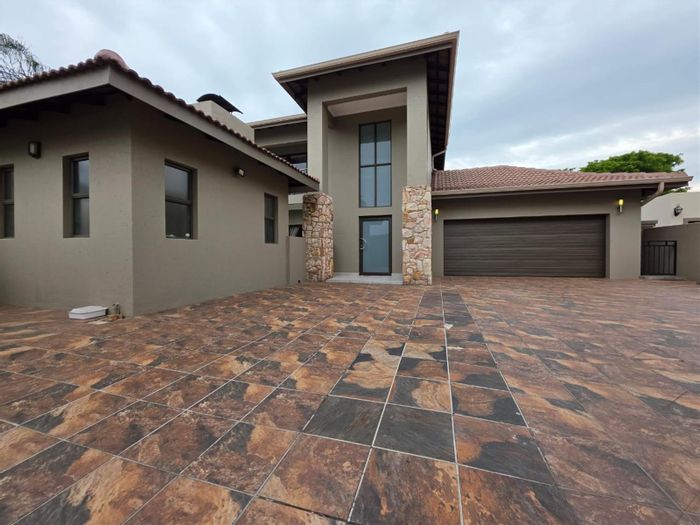 For Sale: House in Greenstone Hill with pool, solar power, and entertainment spaces.