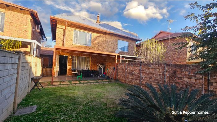 2-Bedroom Townhouse For Sale in Annlin with garden, double garage, and guest parking.