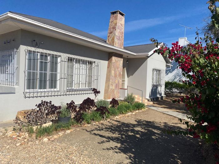 For Sale: House in Prince Albert Central with garden, braai room, and solar panels.