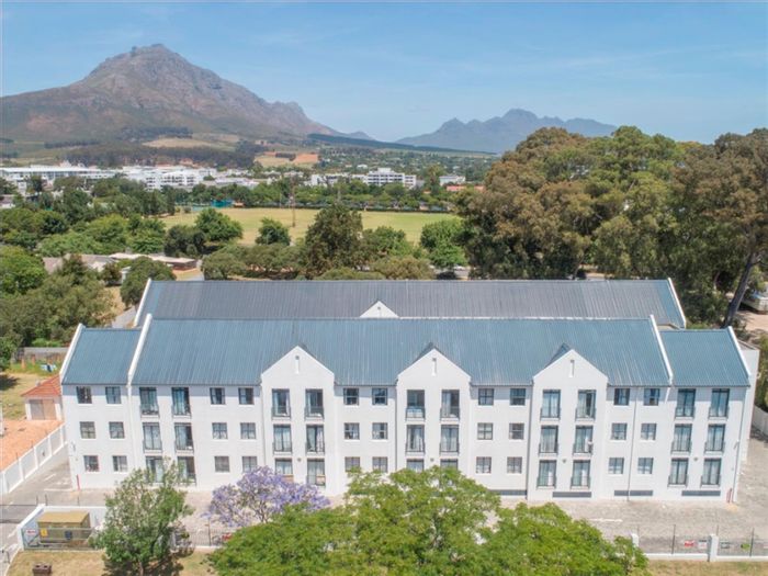 For Sale: Apartment in Stellenbosch Central with secure parking, Wi-Fi, and laundry.