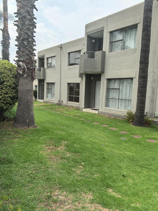Townhouse For Sale in Weltevreden Park: 2 Bedrooms, Pool Access, Covered Parking.