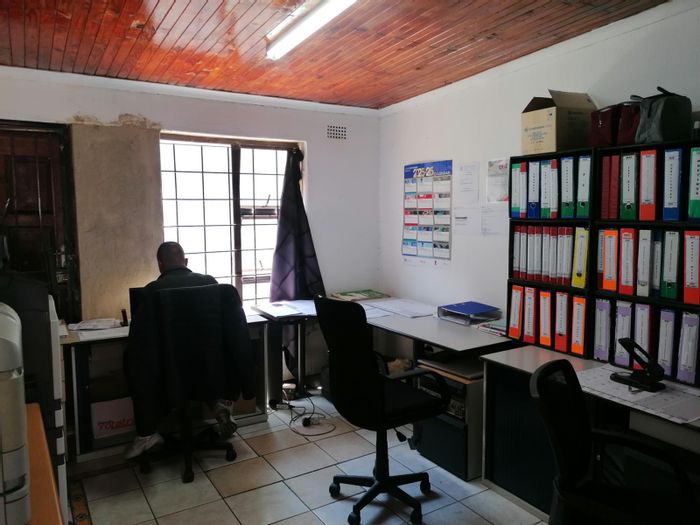 For Sale: Ground-Floor Apartment in Paarlshoop with Private Backyard and Secure Parking.