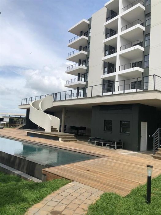 Ballito Central Apartment For Sale: 2-bed, en-suite, patio, pool, pet-friendly.