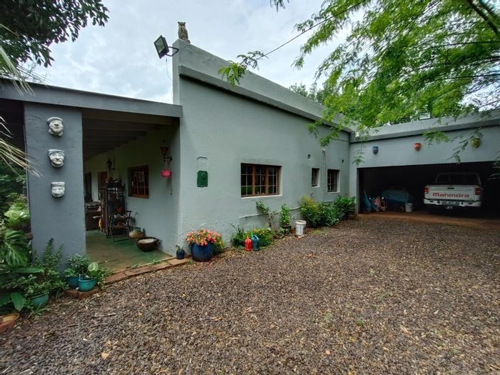 For Sale: 4-Bedroom Farm in Melodie with expansive land and scenic views.