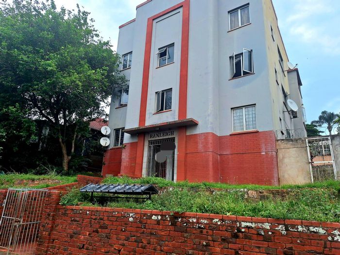 For Sale: House in Umbilo with six flats, investment potential, and renovation opportunity.