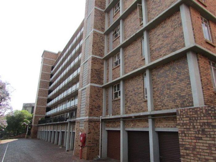 For Sale: 2-bedroom apartment in Wonderboom South with garage and patio access.