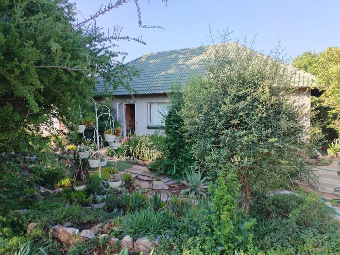 For Sale: Spacious 4-bedroom house in Stilfontein Central with approved flat plans.