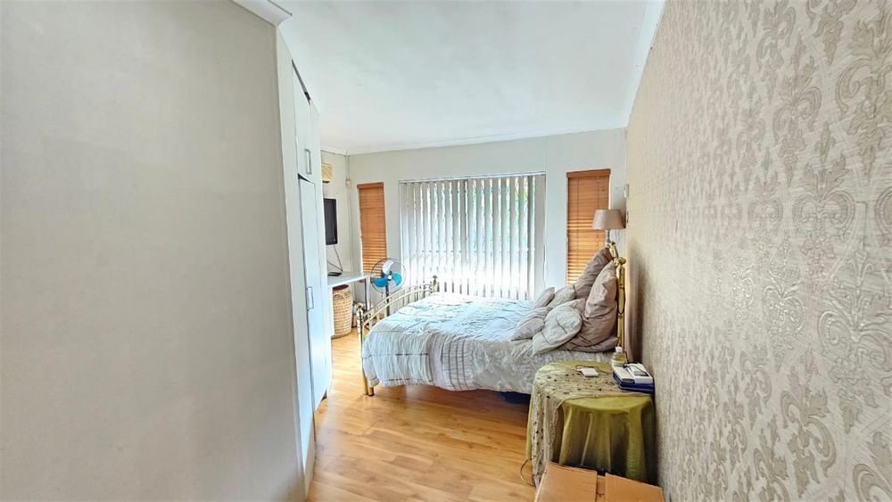 main bedroom with balcony