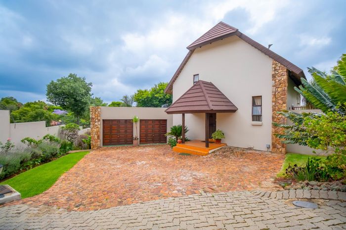 Northcliff Townhouse For Sale: Versatile loft, entertainment balcony, and secure garden flat.